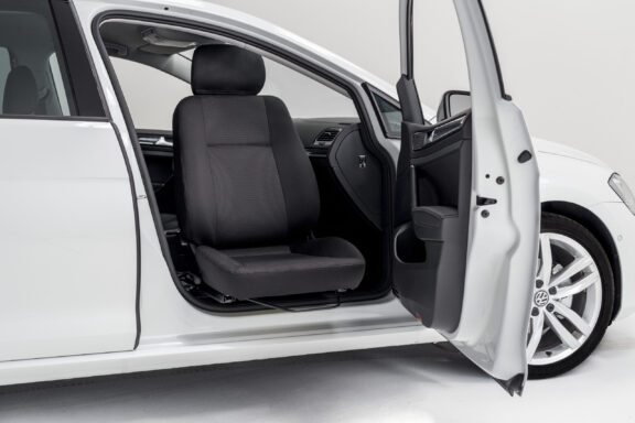 Turnout swivel seat shown rotated to sideways position in the driver's seat.