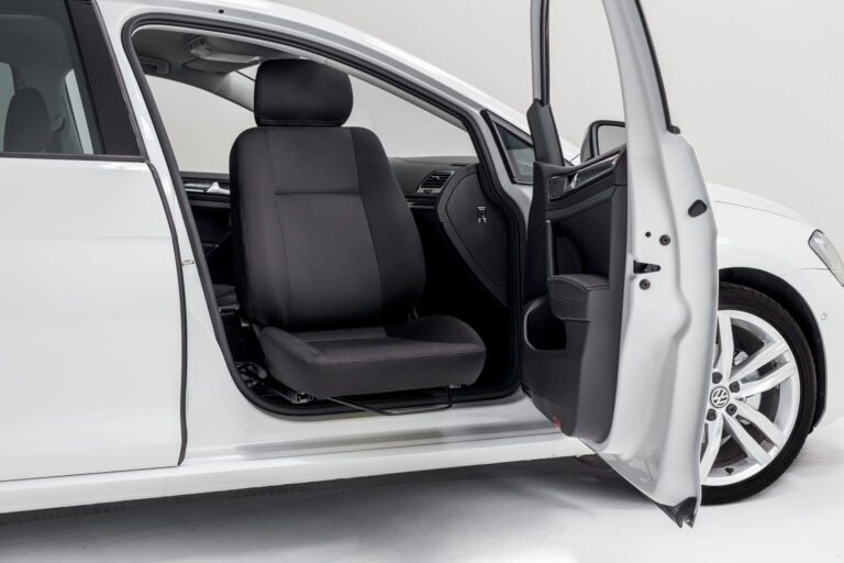 Turnout swivel seat shown rotated to sideways position in the driver's seat.
