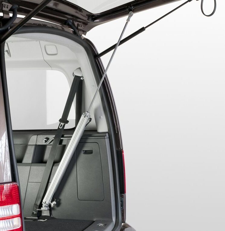 Automatic Tailgate A-Hatch pneumatic arm extending from the van boot floor to the boot door.