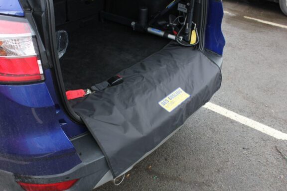 A sill protector covers the edge of the open boot which also has a hoist installed.
