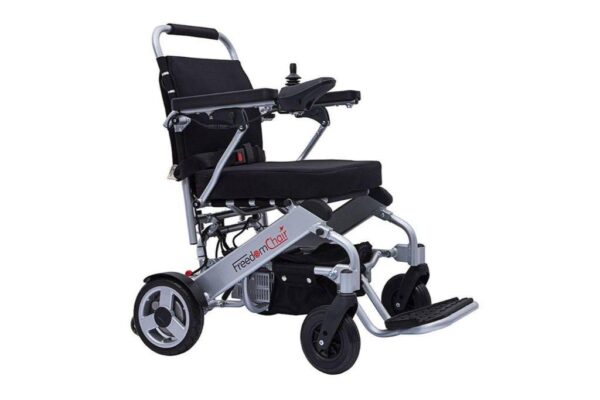 A Freedom Chair A06 electric wheelchair with a silver frame and black trim.