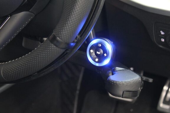 5 Way Remote Control Device installed on a front trigger throttle hand control.