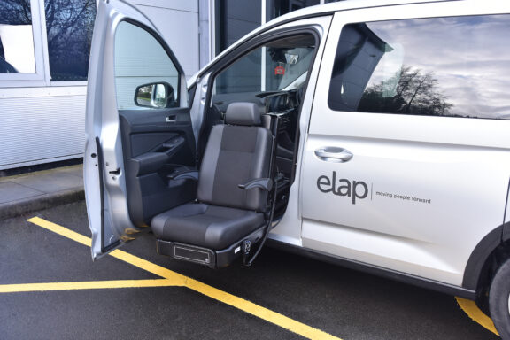 E-Motion X swivel seat in front passenger seat rotated and half lowered.