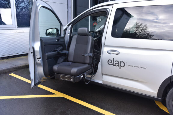 E-Motion X swivel seat in front passenger seat rotated and partially lowered.