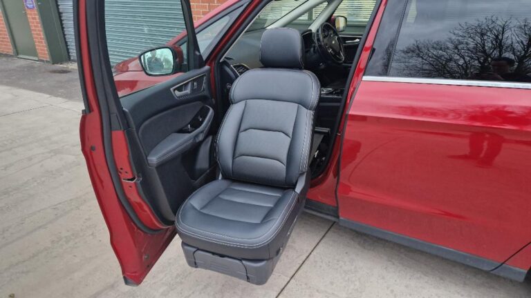 S-Tran swivel seat extended out of the front passenger side.