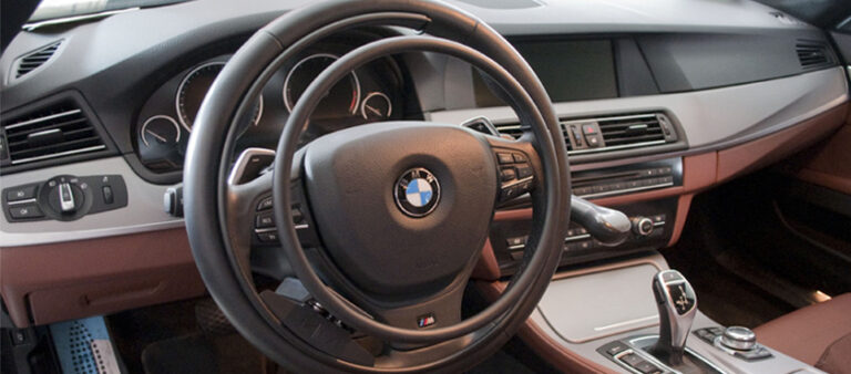 BMW 5 Series interior shown with K0 Gas Ring installed in front of the steering wheel.